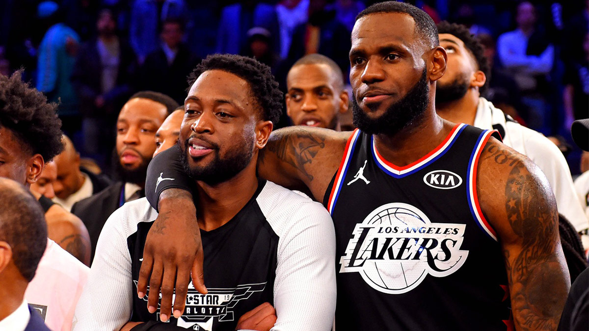 Team Lebron forward Lebron James of the Los Angeles Lakers (23) and Team Lebron guard Dwayne Wade of the Miami Heat (3) after the 2019 NBA All-Star Game at Spectrum Center.