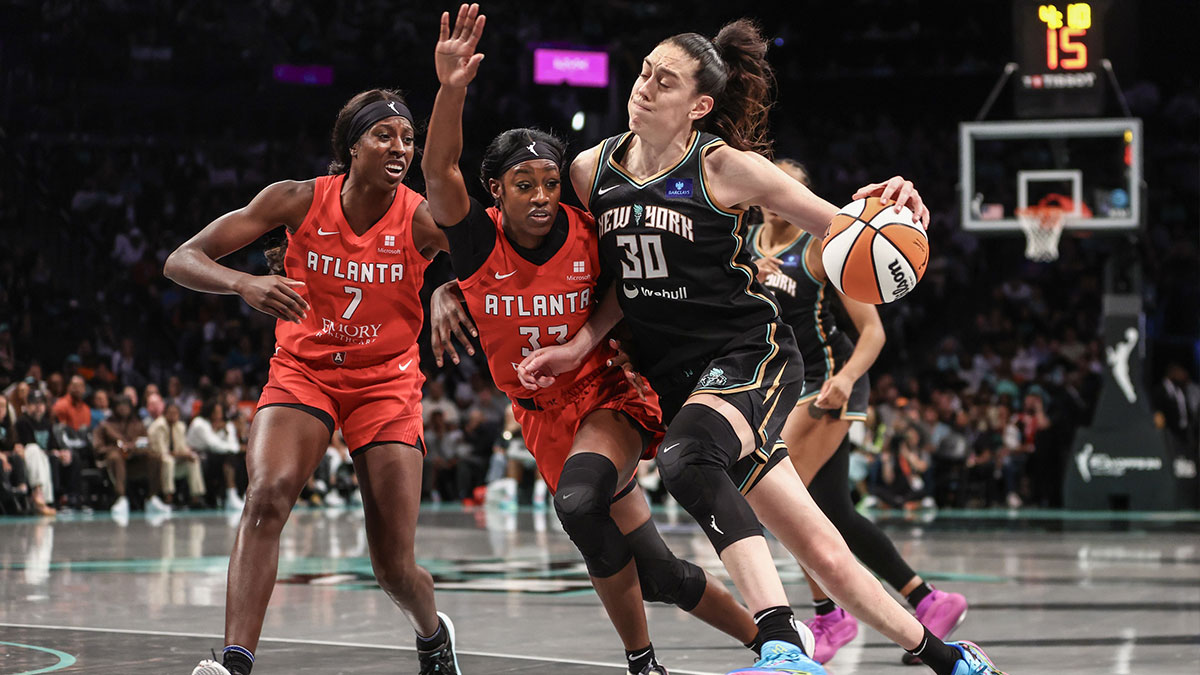 New York Liberty forward Breanna Stewart (30) drives past Atlanta Dream guard Maya Caldwell (33) during game one of the first round of the 2024 WNBA Playoffs