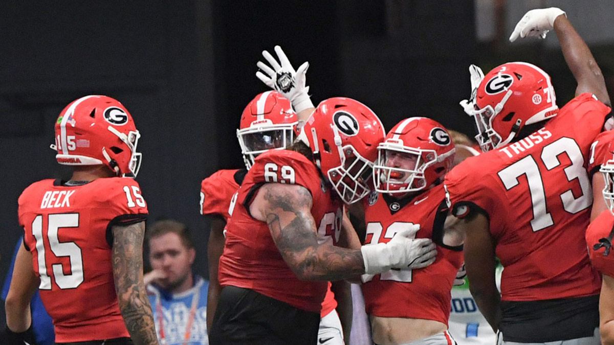 Georgia football wide receiver London Humphreys (16) celebrates with teammates after a touchdown against the Clemson Tigers during the fourth quarter of the 2024 Aflac Kickoff Game at Mercedes-Benz Stadium.