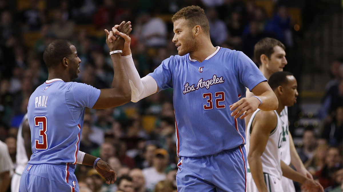 Los Angeles Clippers forward Blake Griffin (32) and guard Chris Paul (3) reacts after a play against the Boston Celtics in the second half at TD Garden. The Clippers defeated the Celtics 119-106. 