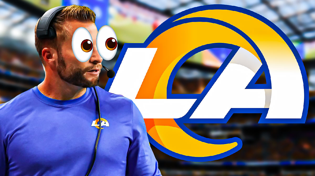 Sean McVay with emoji eyes looking at a Rams logo