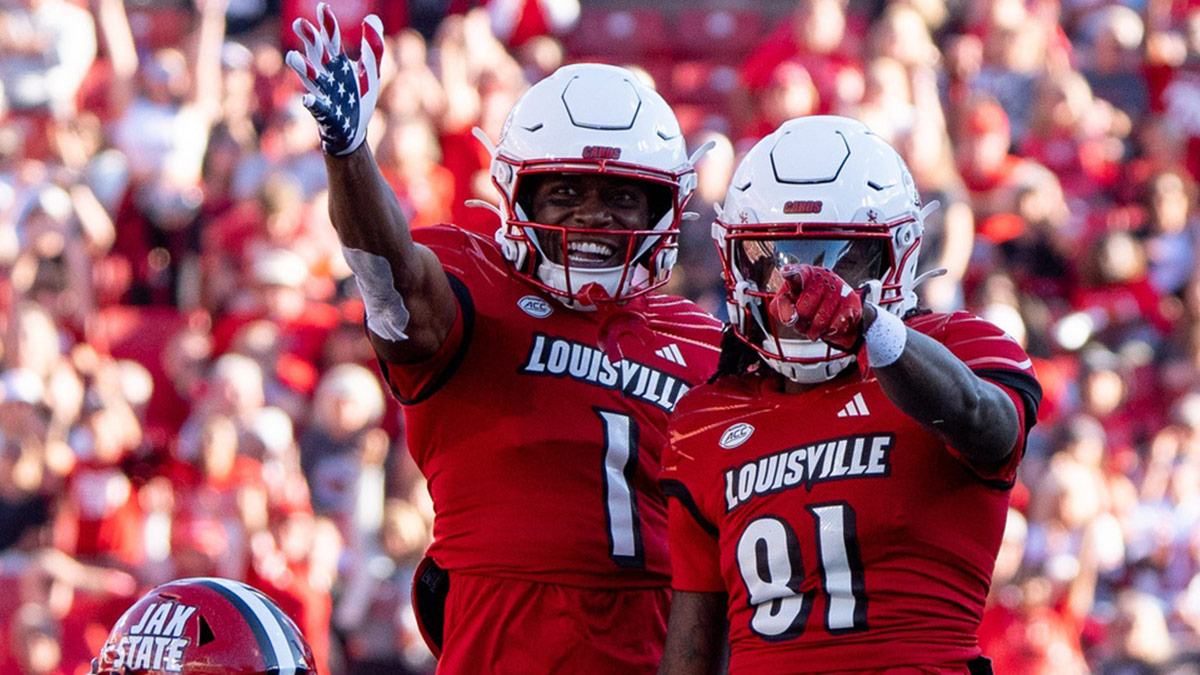 Louisville Cardinals wide receiver Ja'Corey Brooks (1) and wide receiver Cataurus Hicks (81) celebrate their play during their game against the Jacksonville State Gamecocks