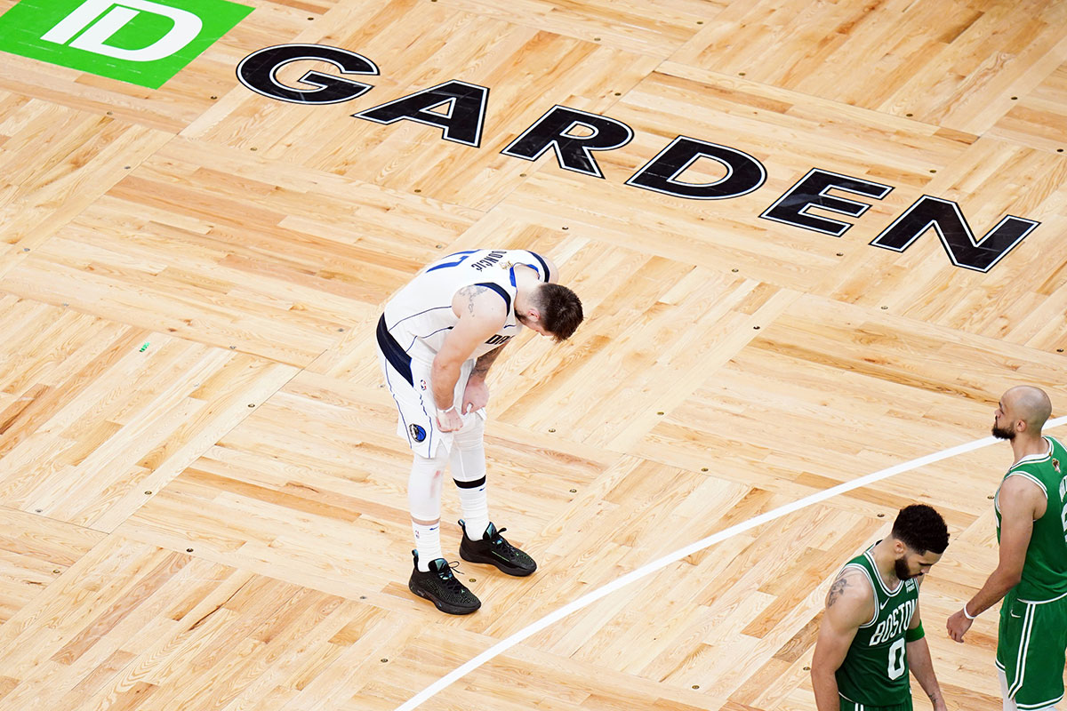 Dallas Mavericks guard Luka Doncic (77) reacts in the fourth quarter against the Boston Celtics during game five of the 2024 NBA Finals at TD Garden.