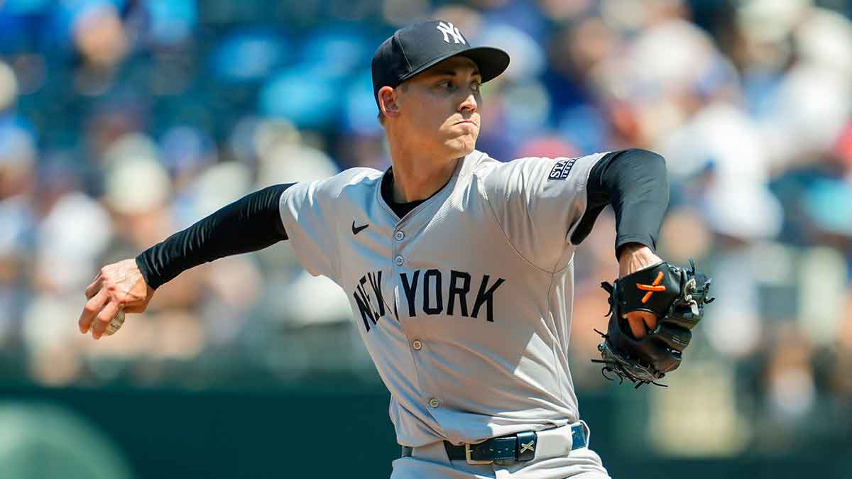 Jun 13, 2024; Kansas City, Missouri, USA; New York Yankees relief pitcher Luke Weaver (30) pitches during the eighth inning against the Kansas City Royals at Kauffman Stadium. 