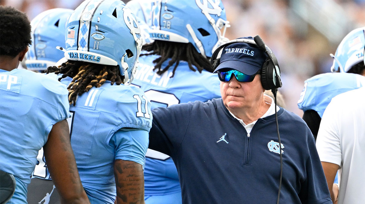 North Carolina Tar Heels head coach Mack Brown with his players in the second quarter at Kenan Memorial Stadium.