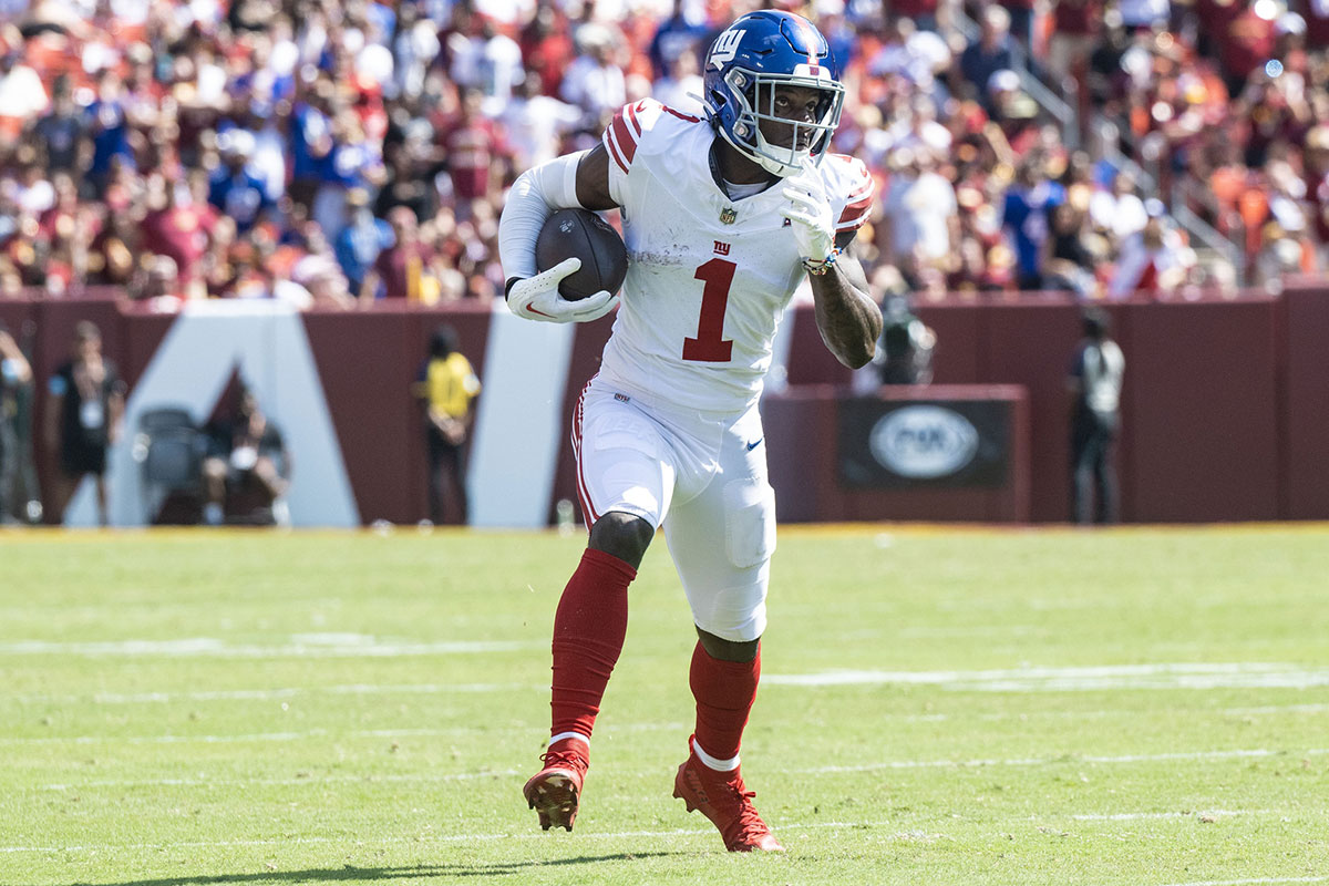 New York Giants wide receiver Malik Nabers (1) runs down field during the first half at Commanders Field.