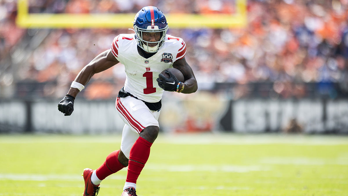 New York Giants wide receiver Malik Nabers (1) runs the ball against the Cleveland Browns during the second quarter at Huntington Bank Field.