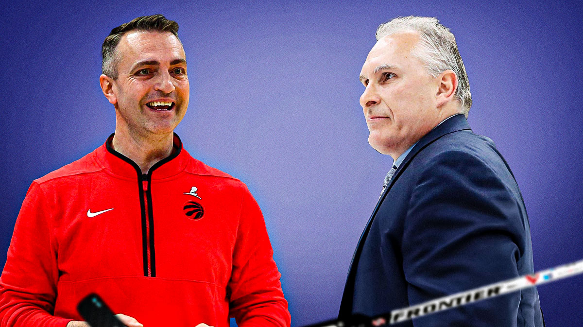 Raptors Darko Rajakovic looking at Maple Leafs Craig Berube