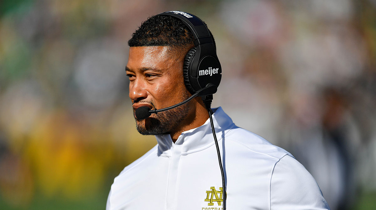 Notre Dame Fighting Irish head coach Marcus Freeman walks to the sideline in the second quarter against the Northern Illinois Huskies at Notre Dame Stadium
