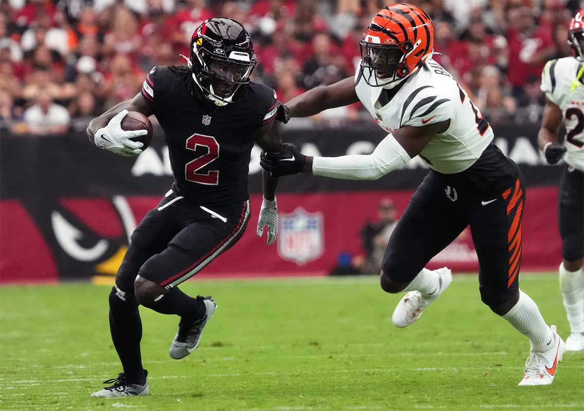 Oct 8, 2023; Glendale, Arizona, United States; Arizona Cardinals receiver Marquise Brown (2) tries to get past Cincinnati Bengals safety Jordan Battle (27) at State Farm Stadium.