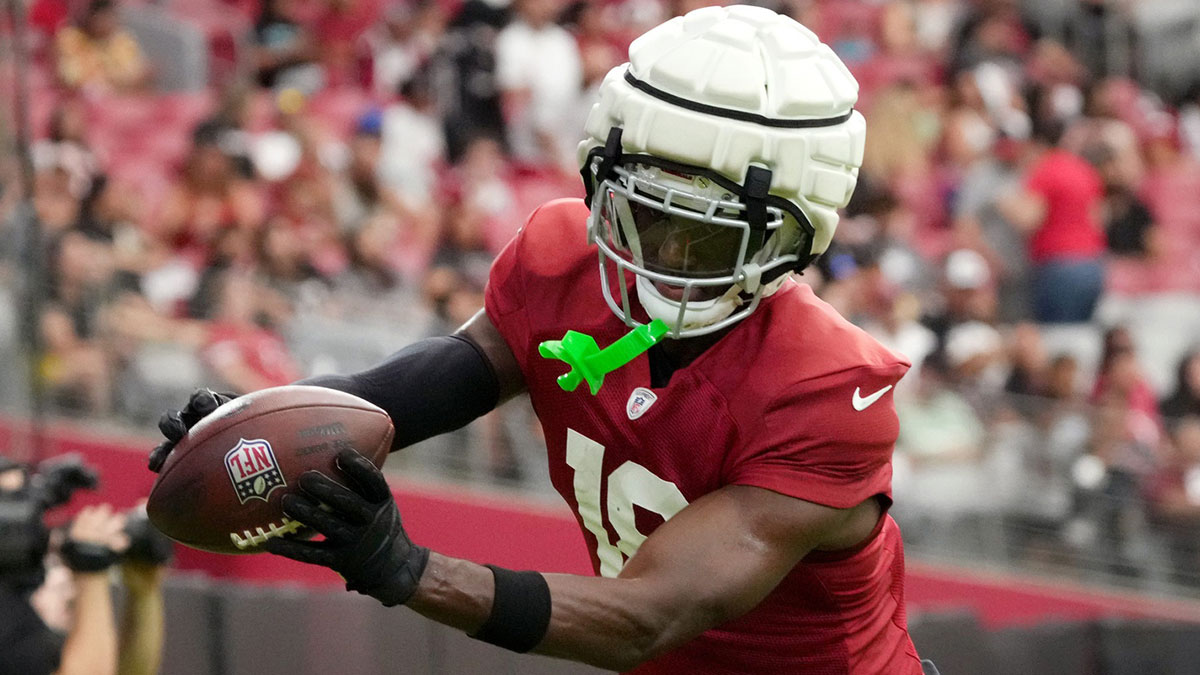 Arizona Cardinals receiver Marvin Harrison Jr. (18) catches a pass in the end. zone during training camp at State Farm Stadium in Glendale, Ariz., on Saturday, Aug. 3, 2024.