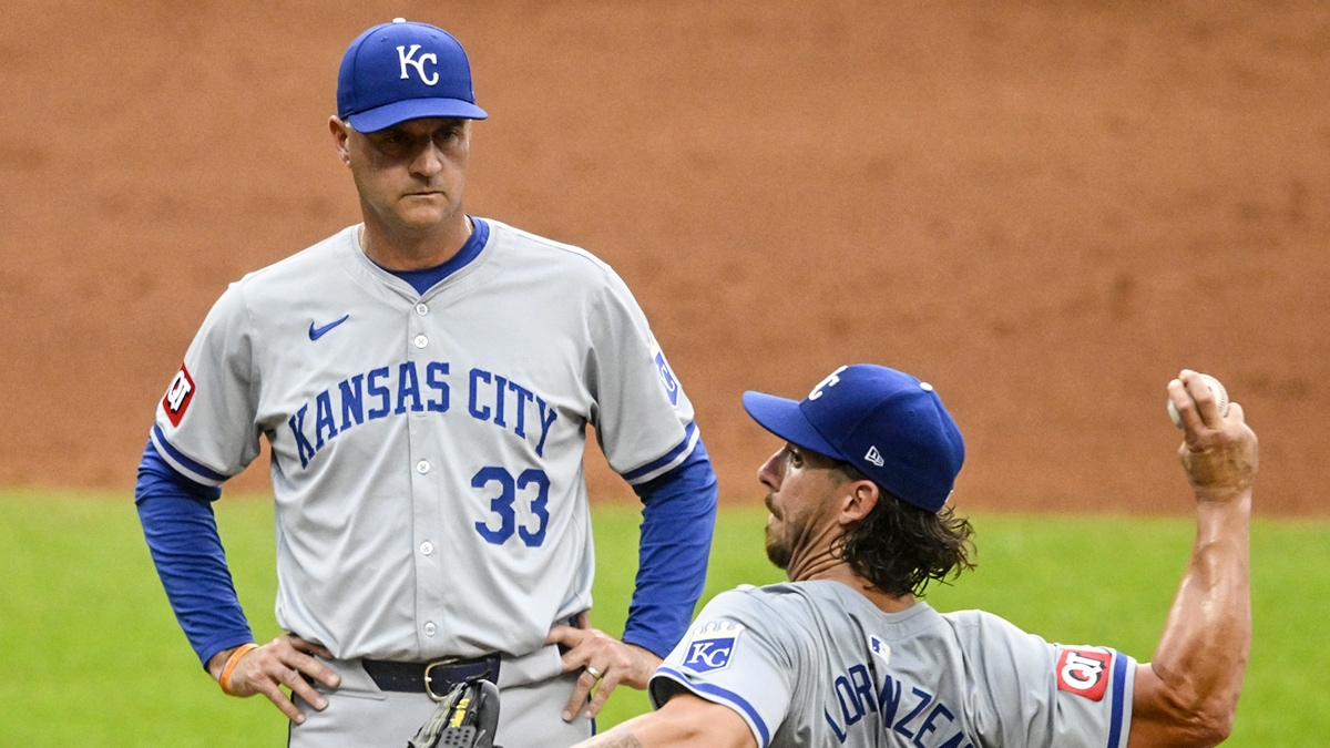 Kansas City Royals manager Matt Quatraro (33) watches as starting pitcher Michael Lorenzen (24) throws a practice pitch in the second inning against the Cleveland Guardians at Progressive Field.