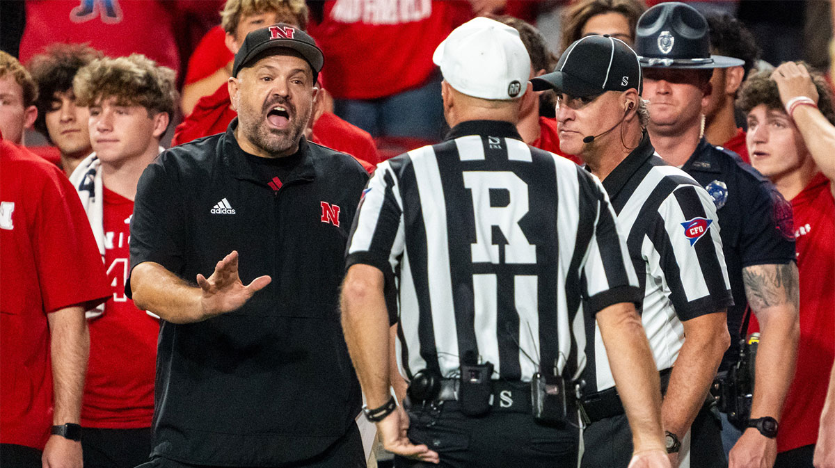 Nebraska Cornhuskers head coach Matt Rhule talks with officials after an interception during the second quarter against the Illinois Fighting Illini at Memorial Stadium.