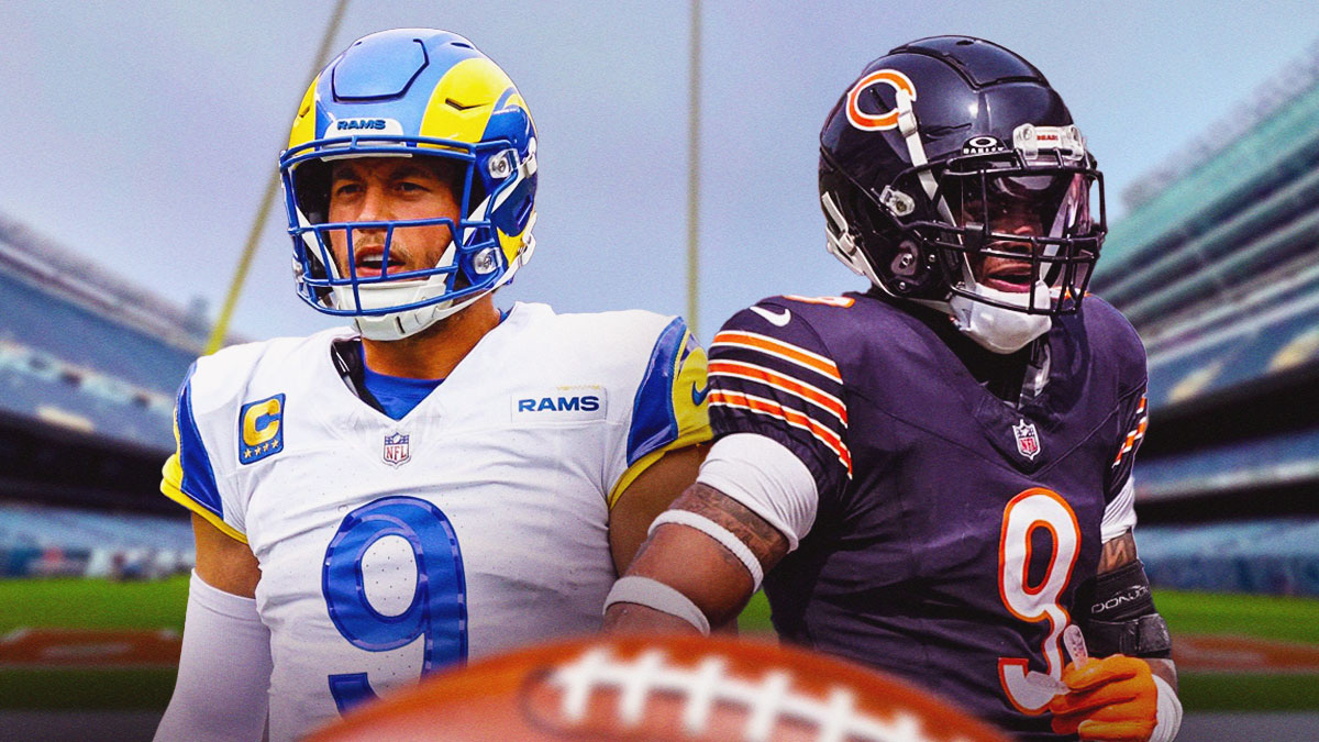 Matthew Stafford next to Jaquan Brisker in front of Soldier Field.