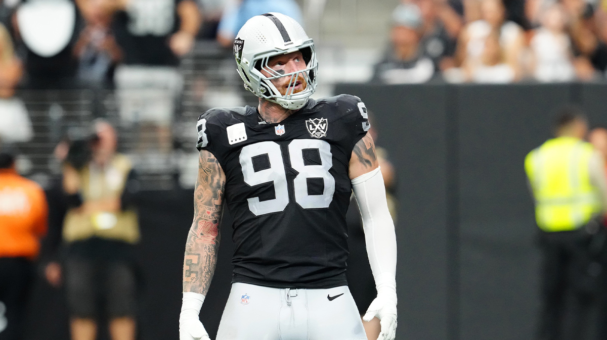 Las Vegas Raiders defensive end Maxx Crosby (98) celebrates after getting a sack against the Carolina Panthers during the second quarter at Allegiant Stadium.