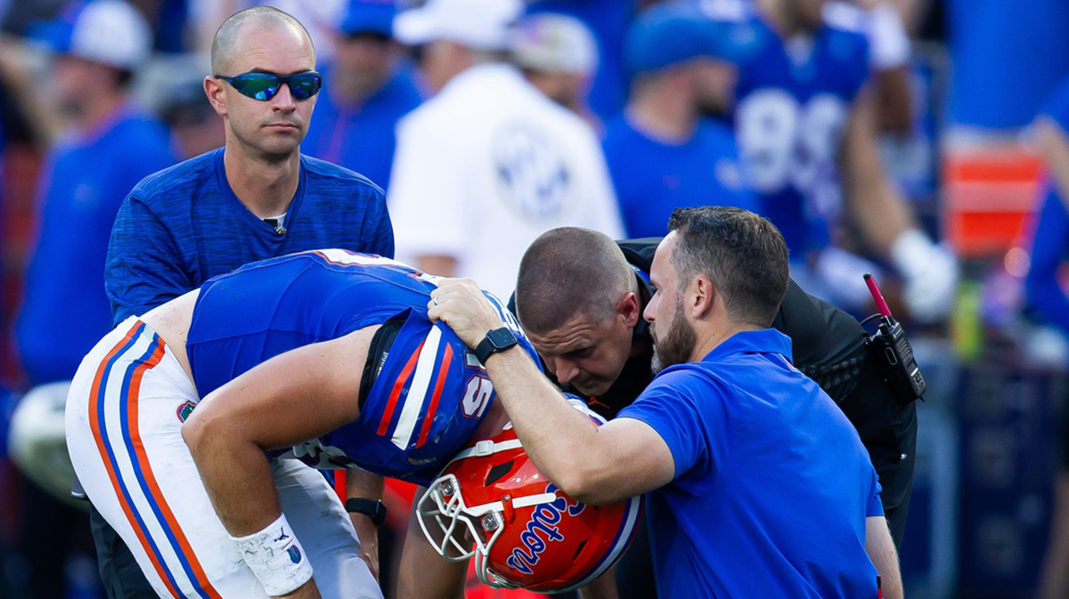 Florida Gators quarterback Graham Mertz (15) is injured in the second half during the season opener at Ben Hill Griffin Stadium in Gainesville, FL on Saturday, August 31, 2024 against the University of Miami Hurricanes in the second half. Miami defeated the Gators 41-17.