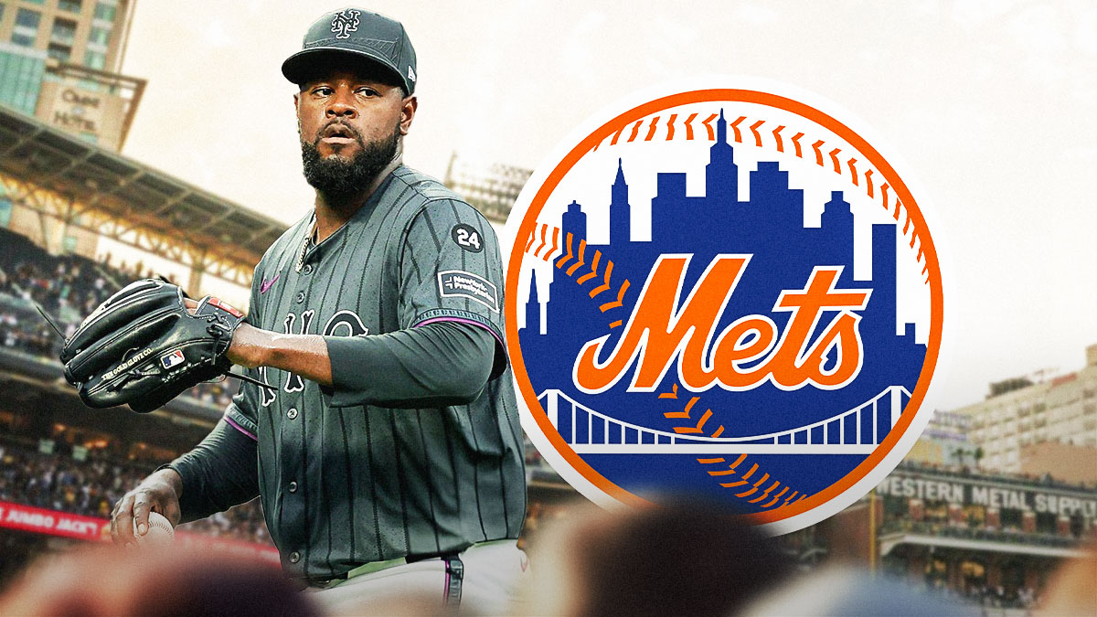 Luis Severino wearing Mets gear. Mets logo in the background.