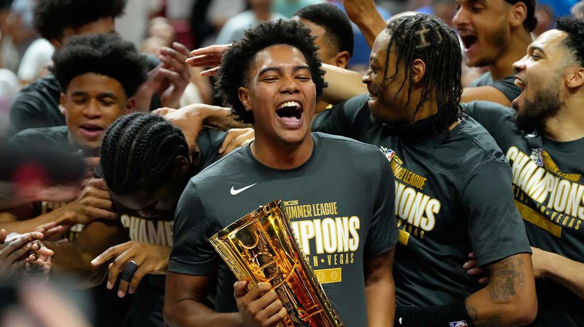 Miami Heat lift the 2025 Summer League Champions trophy after defeating the Memphis Grizzlies in overtime at Thomas & Mack Center.