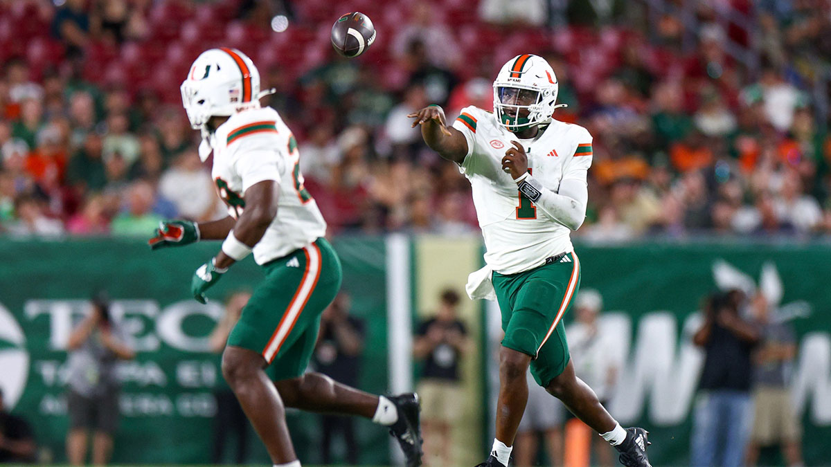 Sep 21, 2024; Tampa, Florida, USA; Miami Hurricanes quarterback Cam Ward (1) throws a pass against the South Florida Bulls in the third quarter at Raymond James Stadium. Mandatory Credit: Nathan Ray Seebeck-Imagn Images