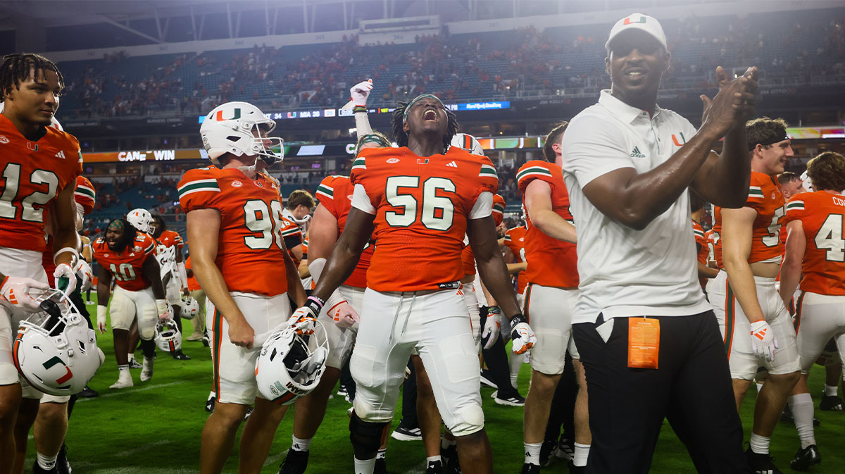 Miami football players celebrate after win vs. Virginia Tech football