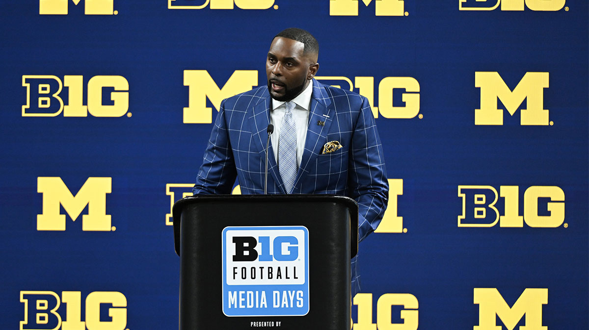 Michigan Wolverines head coach Sherrone Moore speaks to the media during the Big 10 football media day at Lucas Oil Stadium.