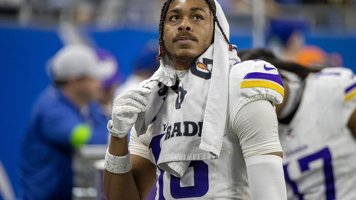 Minnesota Vikings wide receiver Justin Jefferson (18) looks at the big screen during second half of the game against the Detroit Lions at Ford Field.