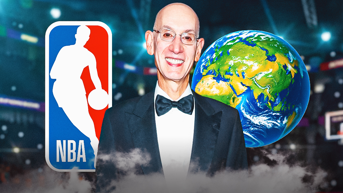 NBA's Adam Silver stands next to globe with Europe in it