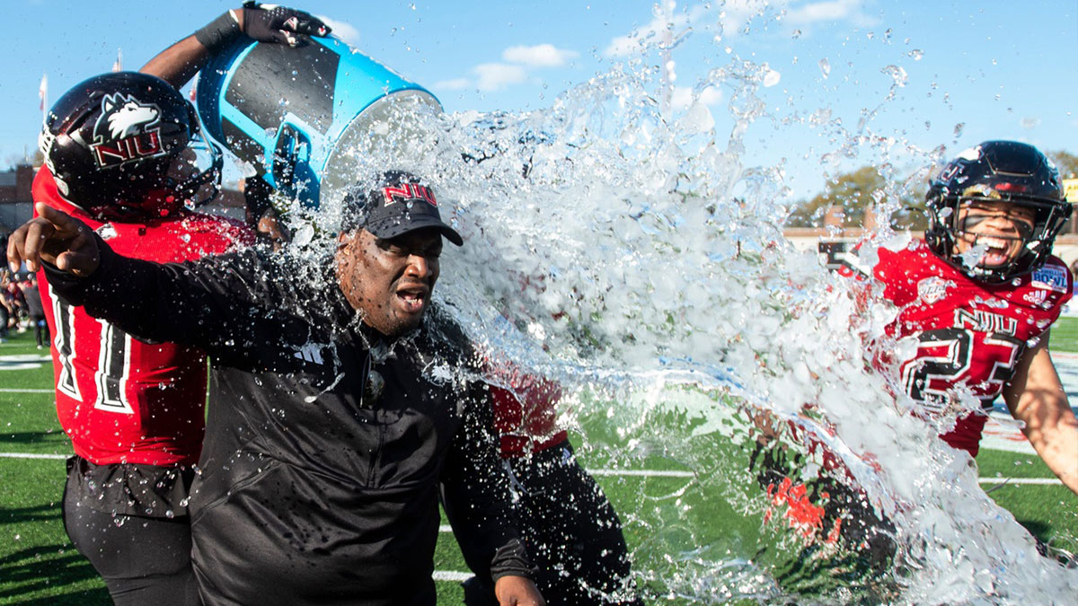Camellia Bowl: Northern Illinois head coach Thomas Hammock gets doused after the Huskies defeated Arkansas State.