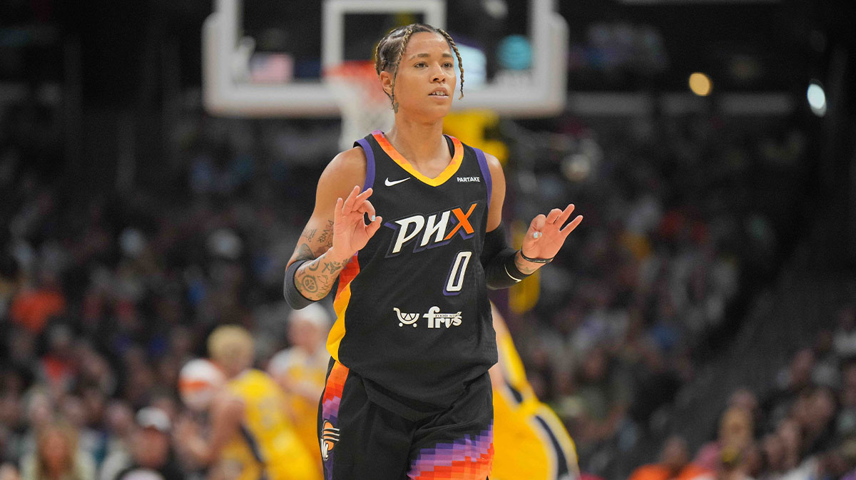 Phoenix Mercury guard Natasha Cloud (0) gestures after a three-point basket against the LA Sparks in the second half at Crypto.com Arena.