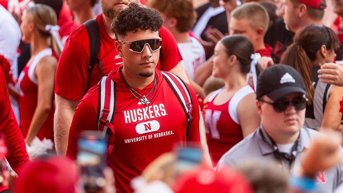 Nebraska Cornhuskers quarterback Dylan Raiola (15) leads the team into the facilities before the game against the Colorado Buffaloes at Memorial Stadium.