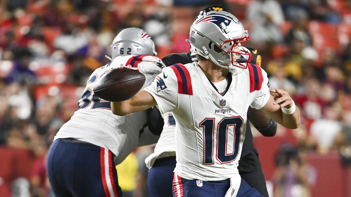 New England Patriots quarterback Drake Maye (10) throws during the first half against the Washington Commanders at Commanders Field.