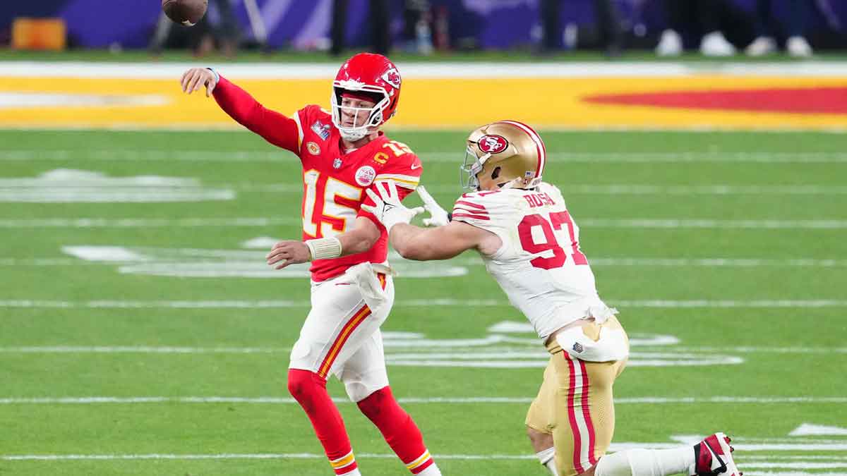 Nick Bosa trying to sack Patrick Mahomes in the Super Bowl. Two of the best NFL players