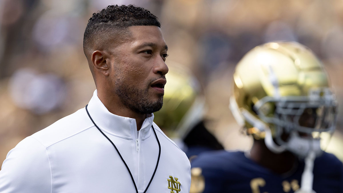 Notre Dame head coach Marcus Freeman jogs the field during warm ups before a NCAA college football game between Notre Dame and Northern Illinois at Notre Dame Stadium on Saturday, Sept. 7, 2024, in South Bend.
