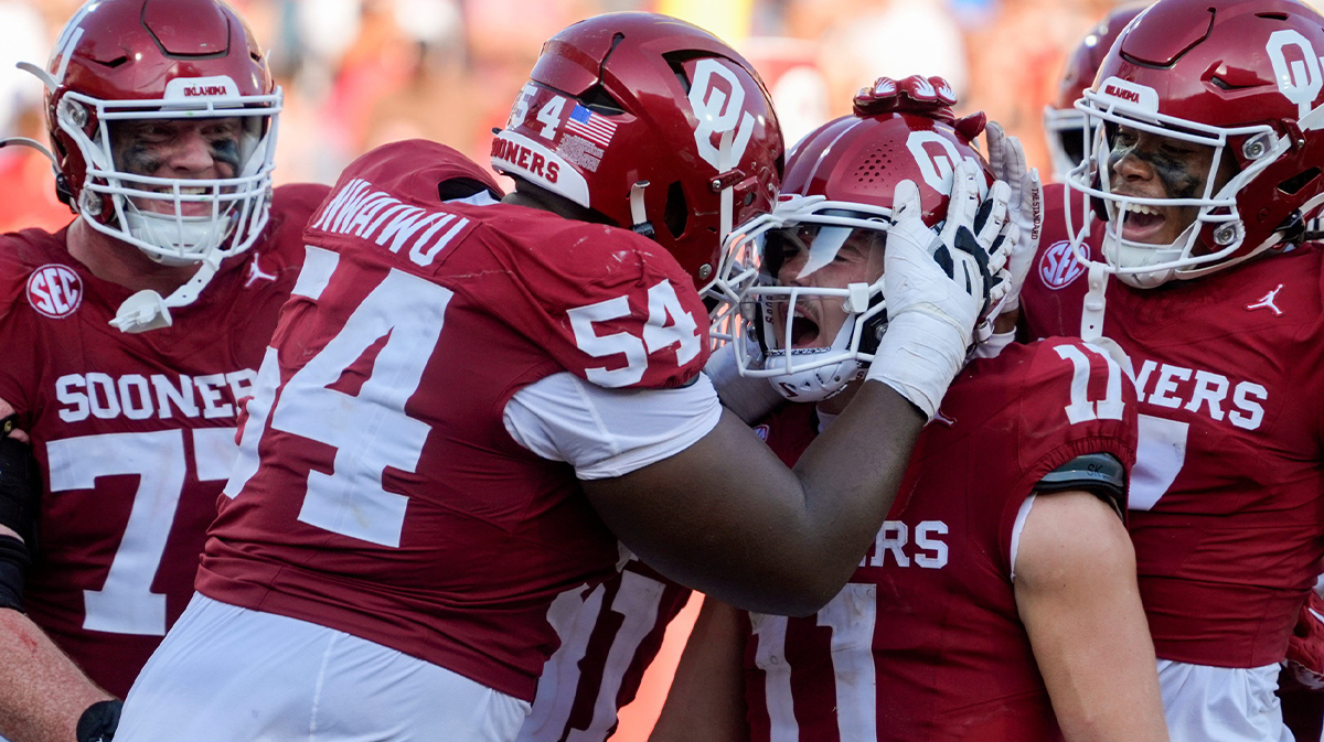 Oklahoma Sooners quarterback Jackson Arnold (11) celebrates with offensive lineman Febechi Nwaiwu (54) after a touchdown during a college football game between the University of Oklahoma Sooners (OU) and the Tulane Green Wave at Gaylord Family - Oklahoma Memorial Stadium in Norman, Okla., Saturday, Sept. 14, 2024.