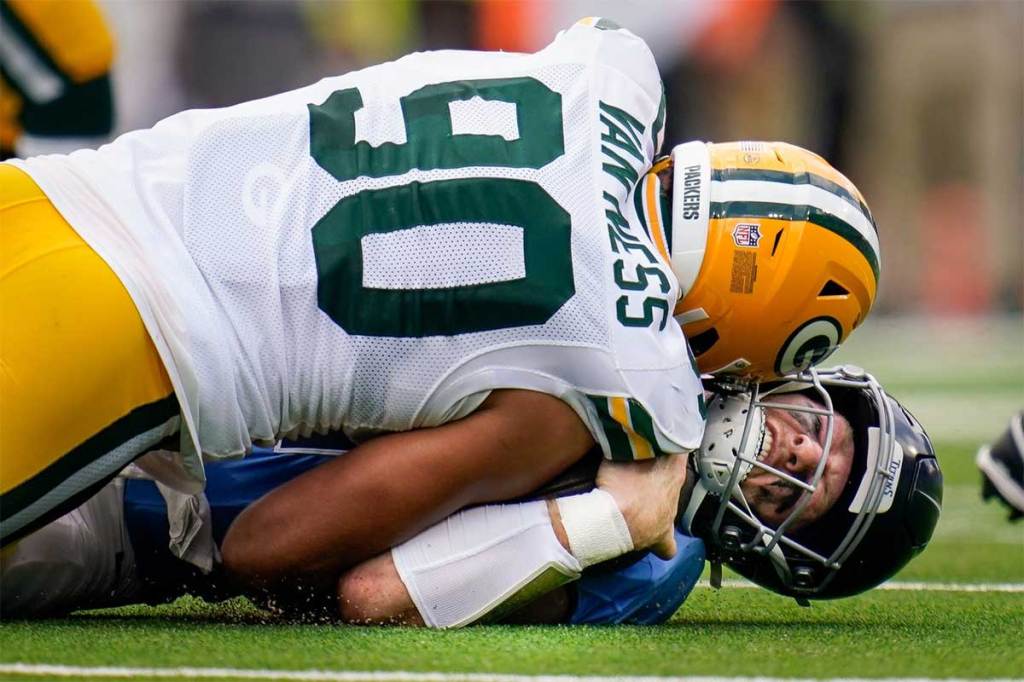 Tennessee Titans quarterback Will Levis (8) is sacked by Green Bay Packers defensive end Lukas Van Ness (90) during the second quarter at Nissan Stadium in Nashville, Tenn.