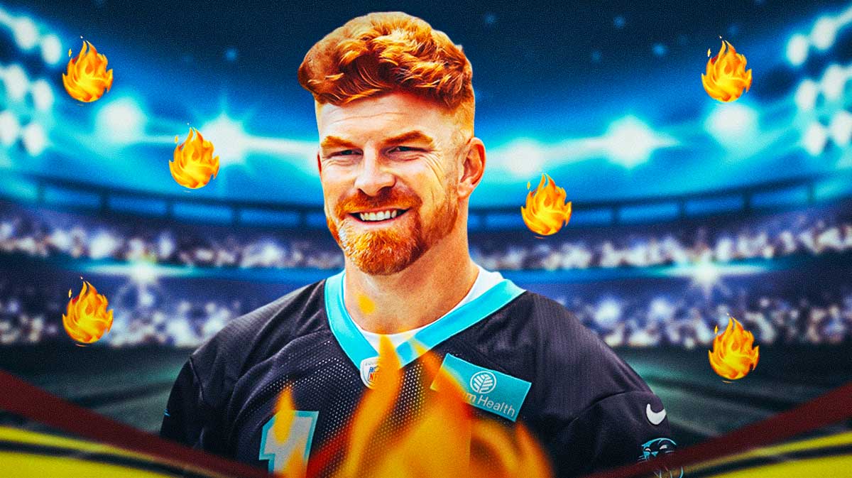 Andy Dalton with fire surrounding him.