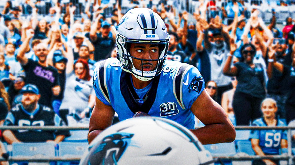 Bryce Young cries next to Panthers fans