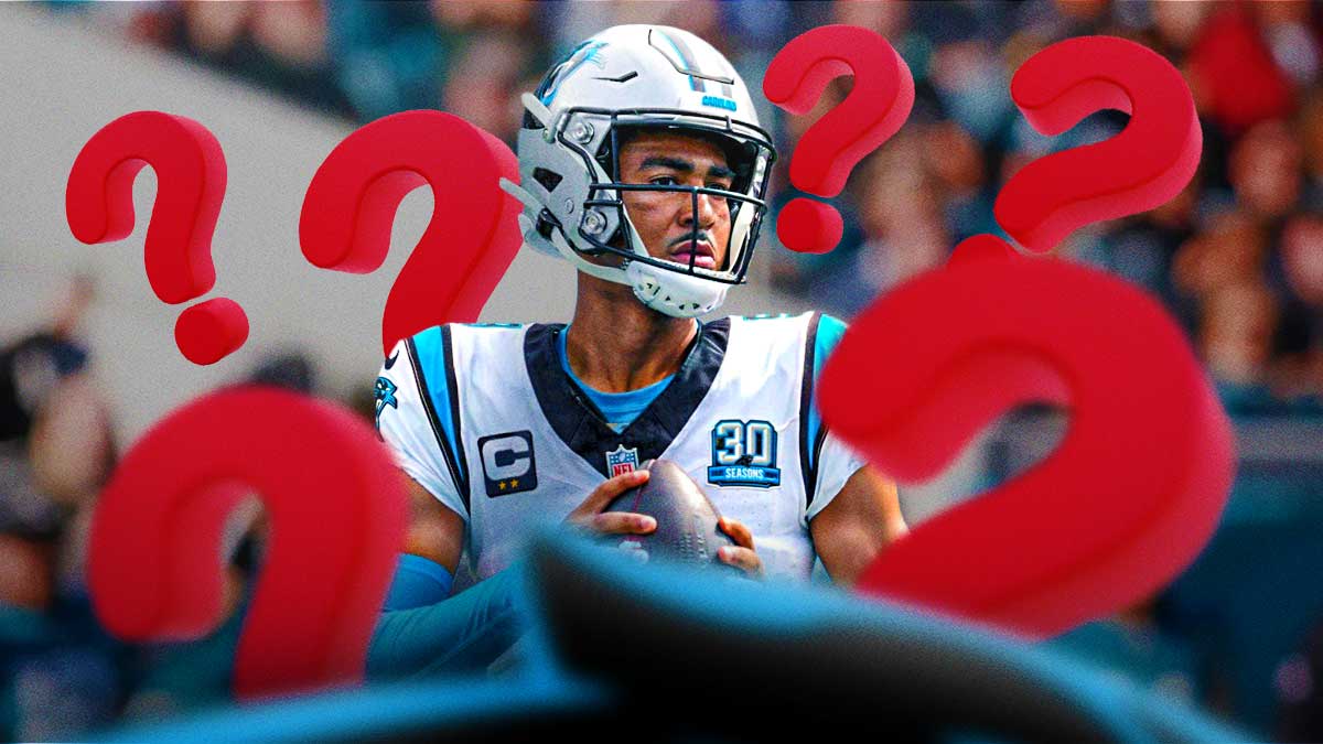 Panthers' Bryce Young stepping back to pass.