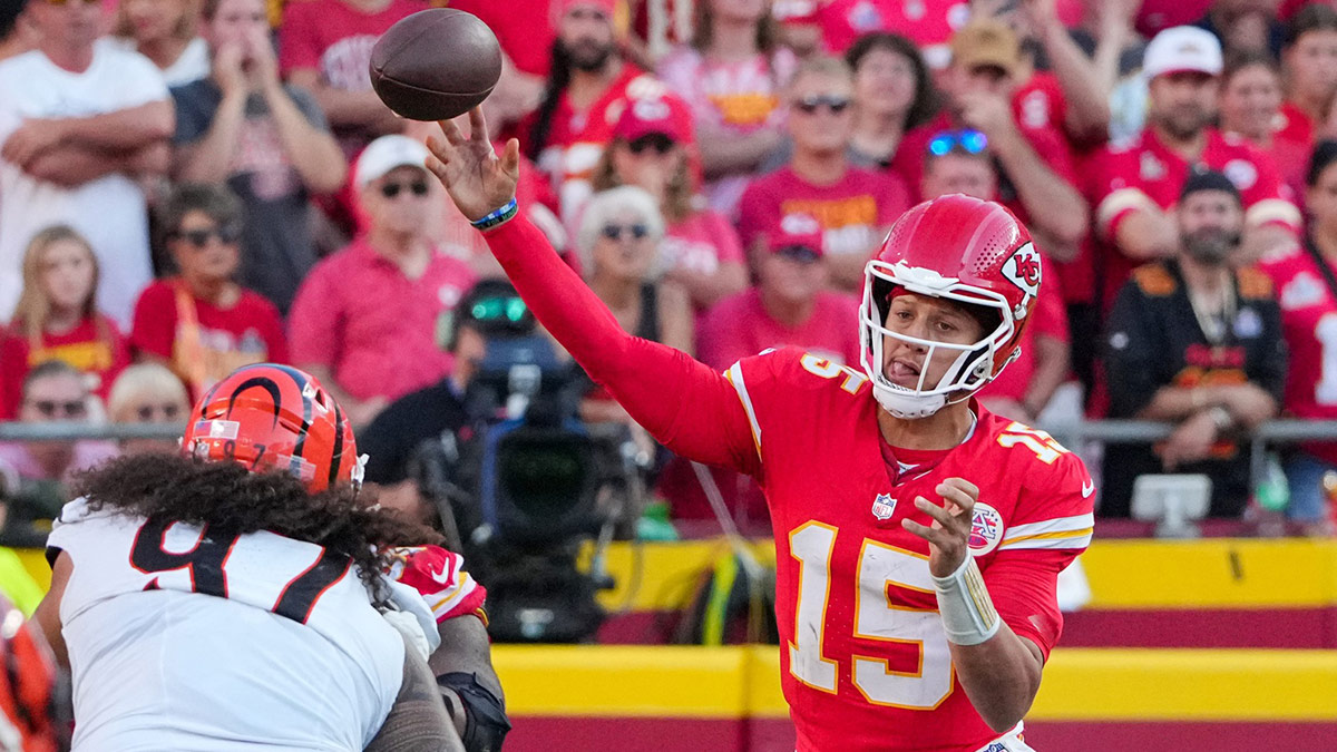 Kansas City Chiefs quarterback Patrick Mahomes (15) throws a pass against the Cincinnati Bengals during the second half at GEHA Field at Arrowhead Stadium.