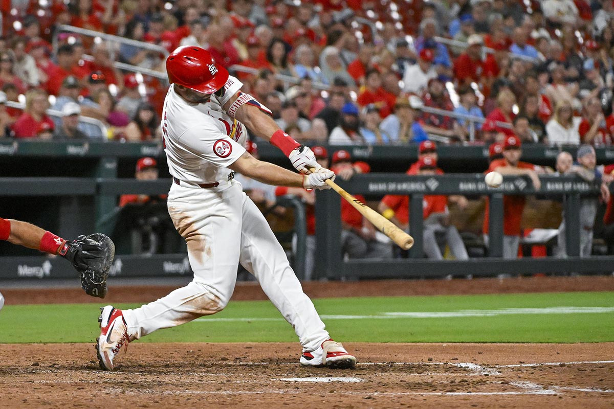 St. Louis Cardinals first baseman Paul Goldschmidt (46) hits a go ahead one run double against the Cincinnati Reds during the eighth inning at Busch Stadium.