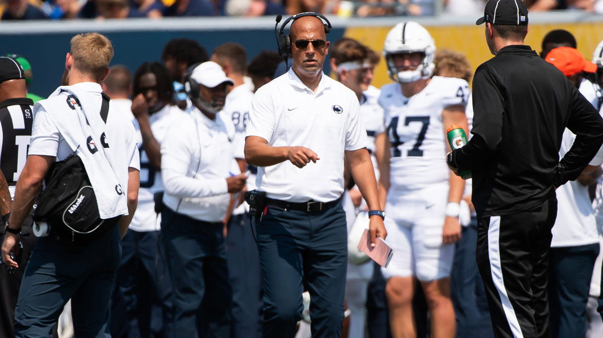 Penn State head coach James Franklin walks the sideline in the first half of an NCAA football game against West Virginia, Saturday, August 31, 2024, in Morgantown, W. Va.