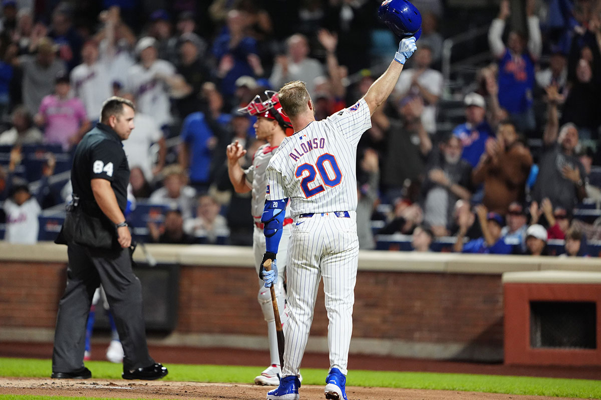 New York Mets first baseman Pete Alonso (20) acknowledges the crowd as he comes up to bat against the Philadelphia Phillies during the first inning at Citi Field.