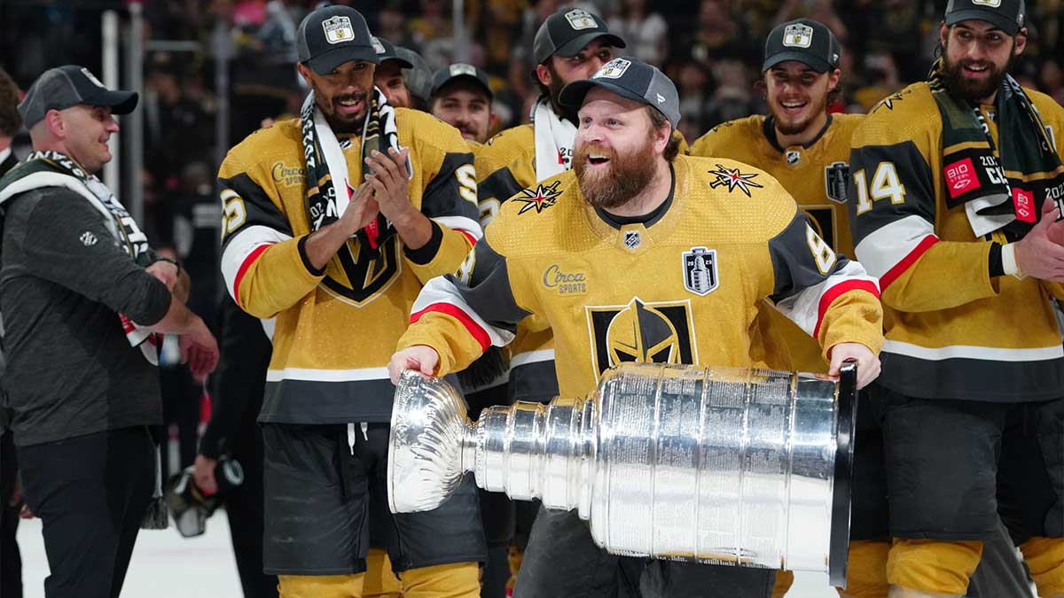 Vegas Golden Knights forward Phil Kessel (8) hoists the Stanley Cup after defeating the Florida Panthers in game five of the 2023 Stanley Cup Final at T-Mobile Arena.