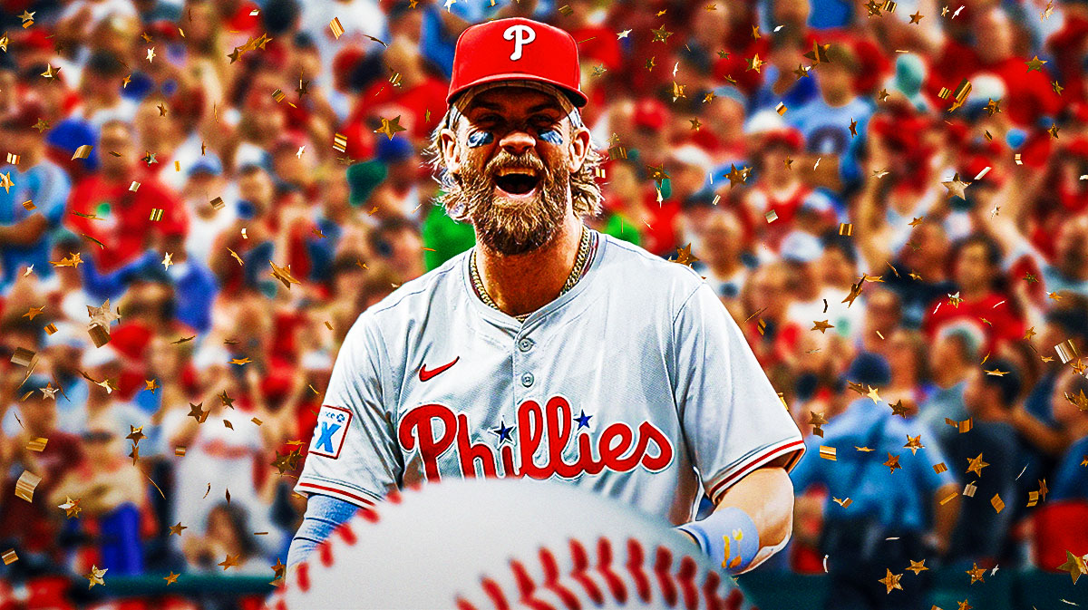 Philadelphia Phillies player Bryce Harper smiling - Phillies fans cheering in background - confetti falling