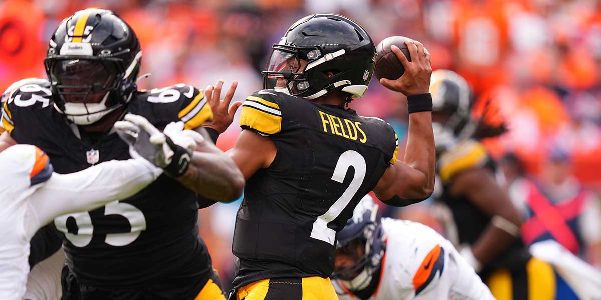 Pittsburgh Steelers quarterback Justin Fields (2) prepares to pass the ball in the second half against the Denver Broncos at Empower Field at Mile High. 