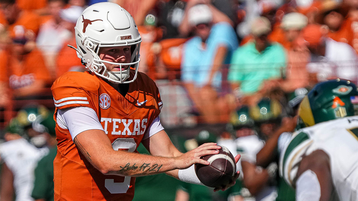 Texas Longhorns quarterback Quinn Ewers (3) snaps the ball during the game against Colorado State at Darrell K Royal-Texas Memorial Stadium in Austin Saturday, Aug. 31, 2024.
