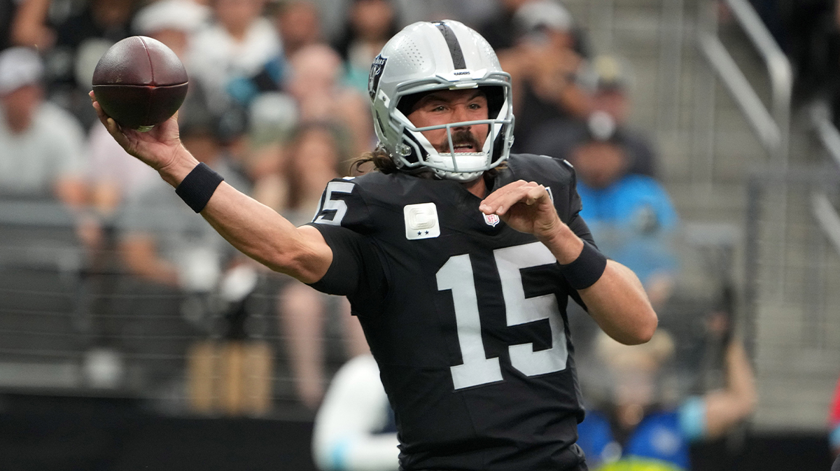 Las Vegas Raiders quarterback Gardner Minshew (15) throws the ball against the Carolina Panthers in the first half at Allegiant Stadium.