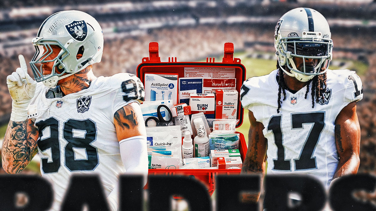 Raiders Davante Adams, Raiders Maxx Crosby with a medical kit next to them.