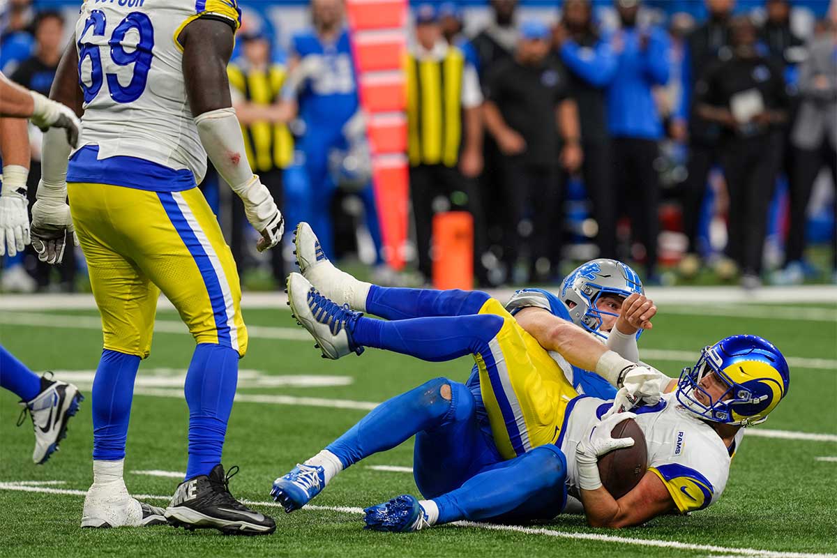 Detroit Lions defensive end Aidan Hutchinson (97) sacks Los Angeles Rams quarterback Matthew Stafford (9) during the second half of the Detroit Lions season opener against the Los Angeles Rams at Ford Field in Detroit, on Sunday, Sept. 8. 2024.