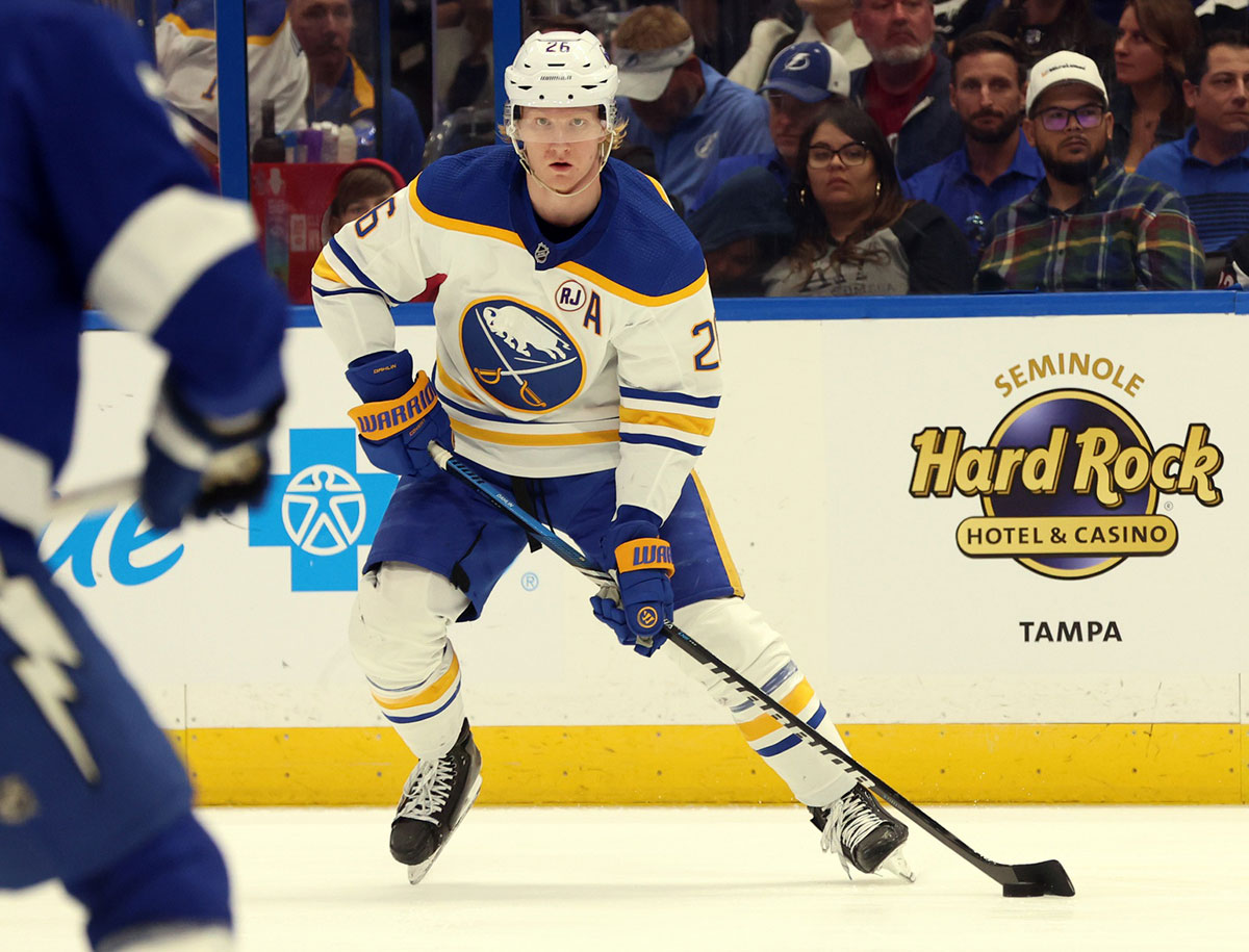 Buffalo Sabres defenseman Rasmus Dahlin (26) skates with the puck against the Tampa Bay Lightning during the second period at Amalie Arena.